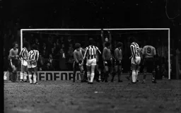 Town wall watches United free kick sail over the bar