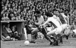 Brian Stein leaves three defenders behind