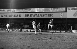 Steve Taylor about to feel the weight of Phil Parkes