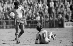 Ricky Hill checks on his teammate Bob Hatton