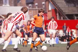 Alan West advances with the ball