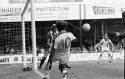 Bob Hatton gets the ball back across the box