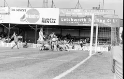Bob Hatton watches the ball go wide