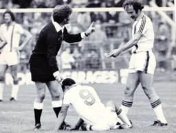 Bob Hatton has words with the ref following a foul on Brian Stein