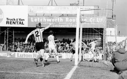 Alan West follows the ball around the post