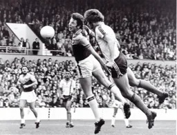 Mike Saxby heads in the Town's second goal
