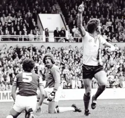 Mike Saxby startes to celebrate