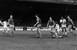 Ricky Hill gives his teammate encouragement