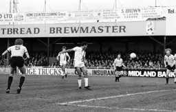 Brian Stein heads for goal