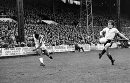 Brian Stein sends in a cross