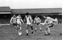 David Moss glides through Chelsea defence on a treacherous surface