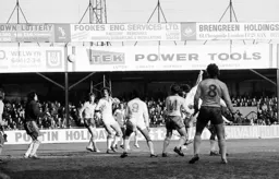 Mike Saxby watches as Mal Donaghy’s header flies towards the goal