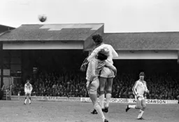Paul Price gets to the ball first