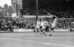 Bob Hatton races onto a back pass