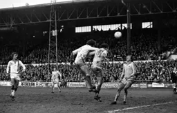 Mike Saxby heads for goal