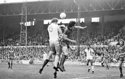 Mike Saxby rises to head towards goal