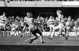Paul Price crosses into the box