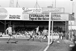 Bob Hatton heads back a cross