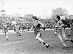 Bob Hatton puts pressure on the Chelsea defender