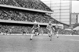 Tony Grealish looks to take the ball
