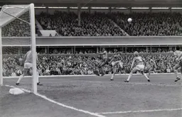 Ricky Hill gets his header over