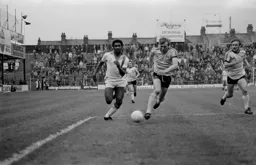 Ricky Hill in a race towards the box