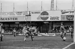 Steve White watches the ball go wide