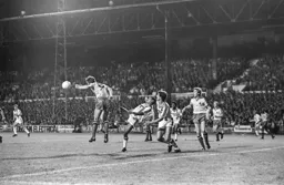 Watford defender clears