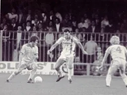 Mark Aizlewood challenges for the ball