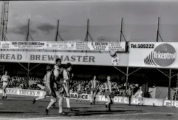 Brian Stein heads for goal