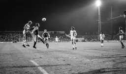 Paul Price above the Swans defence
