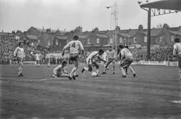 Ricky Hill wriggles through the defence