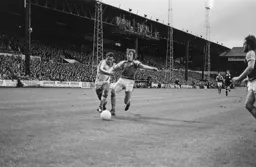 Brian Stein gets past Billy Bonds