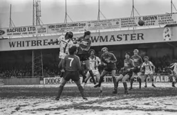 Ricky Hill up high above defence to net the first goal