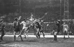 Mal Donaghy gets his head to the ball