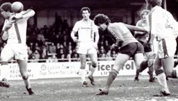 Mike Saxby gets in the way of a Bolton effort