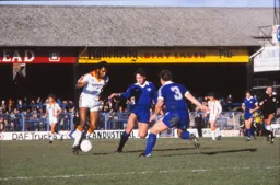 Ricky Hill tries to evade his close markers