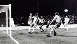 Orient defender Tommy Taylor heads clear