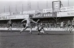 A desperate tackle foils Brian Stein