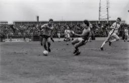 Brian Stein tries to round Orient keeper Mervyn Day