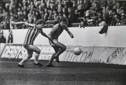 David Moss glides past a Wednesday defender