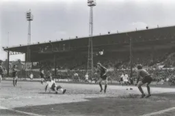 Brian Stein manages to get his foot to the ball