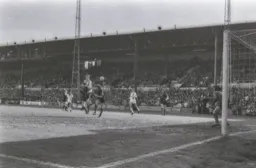 Mike Saxby heads for goal