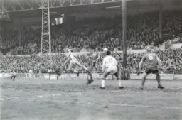 David Moss gets a header away