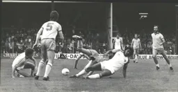 Ricky Hill attempts to make a nuisance of himself in the Owls defence