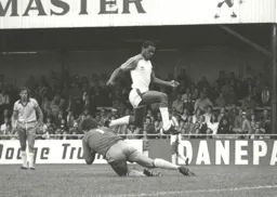 Brian Stein hurdles the Owls goalkeeper