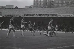 Steve White turn away after scoring