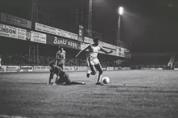 Ricky Hill rounds the defender