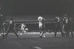 David Moss strikes his free kick towards the wall