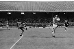 Ricky Hill makes the Oldham defender take avasive action